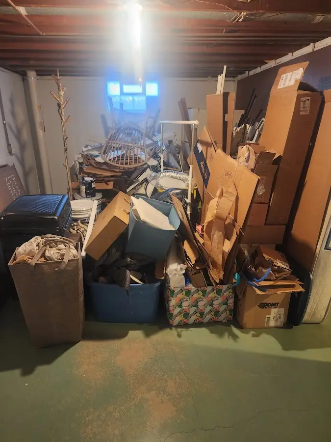 Roll-off dumpster container at job site for 2 Yard Dumpster Rental in St. Albans